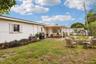 Virtually staged: backyard with covered patio