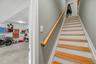 Service stairs from garage to main level