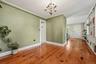 Wood floors and an open flow between the dining and living spaces