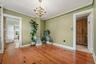 Formal dining room with hardwood floors and easy access to the kitchen