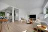Opens to kitchen and dining area...