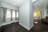 off livingroom behind fpl, door to breezeway and paver patio, yard and garage