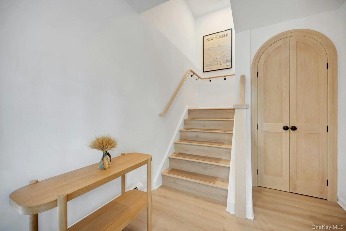 Custom arched entry closet...