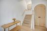 Custom arched entry closet...