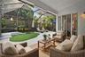 Virtual staging. Covered sitting area within screened patio enclosure