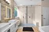 Primary bathroom featuring dual vanities and a dual rainfall walk-in shower