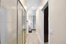 Custom His & Hers closets, a makeup vanity area leading to the primary bathroom