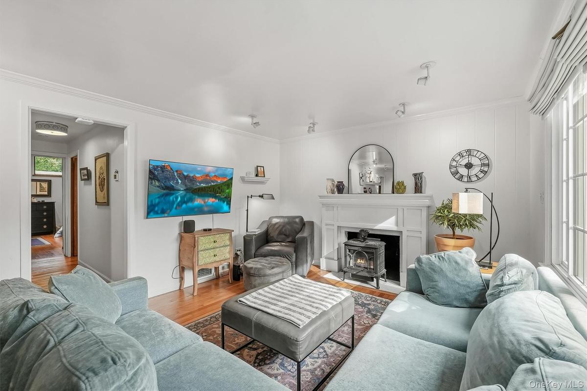 Gleaming hardwood flooring accent the home.