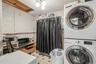The large laundry room/pantry is located off the kitchen.  This truly is one level living.