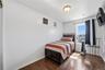 Unit 2 - Bedroom 3. Digitally decluttered; bedding and decor restyled.