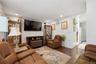 Unit 1 - Separate apartment living room, reverse view. Digitally decluttered; some decor restyled.