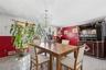 Unit 2 - Dining and bar area. Virtually staged and digitally decluttered.