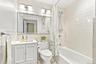 Hall bath with tub shower