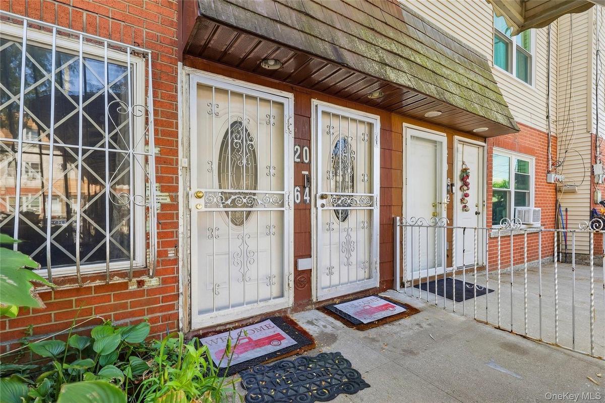 Front entrance detail. Digitally decluttered.