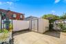 Backyard and storage shed, alternate view. Digitally decluttered.