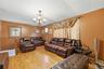 Unit 2 - Duplex living room. Digitally decluttered; some decor restyled.