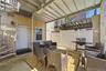 Covered rear patio, reverse view. Digitally decluttered.