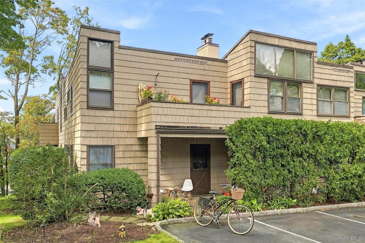 Convenient entry and exit into your one level home on the corner with a designated parking space immediately outside your private entrance.
