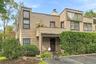 Convenient entry and exit into your one level home on the corner with a designated parking space immediately outside your private entrance.