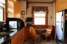 Birch wood-finish cabinetry with  trash compactor in sink   and granites tiles.All stainless steel  appliances
