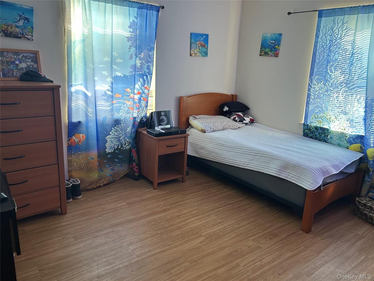 Bedroom with light wood-type flooring