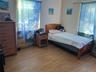 Bedroom with light wood-type flooring