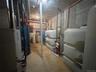 Utilities with heating unit and water heater