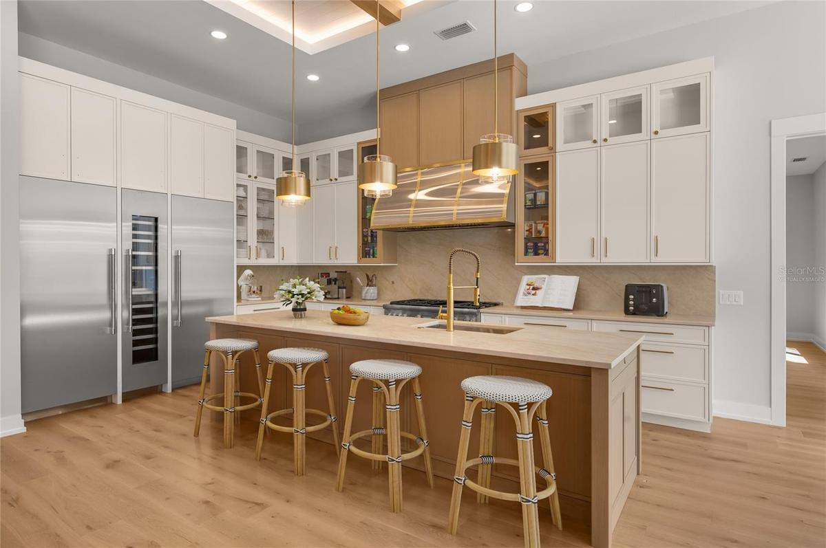 Virtually staged—no detail spared, with high-end appliances, custom cabinetry, and elevated finishes throughout.