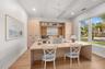 Virtually staged, first floor built in office.