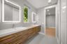 Jack/Jill en suite features double sinks and walk in shower.