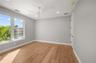 Second floor -5th bedroom overlooks the back yard with walk in closet and full designer bathroom.