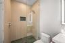 5th bedroom en suite features this custom designed walk in shower.