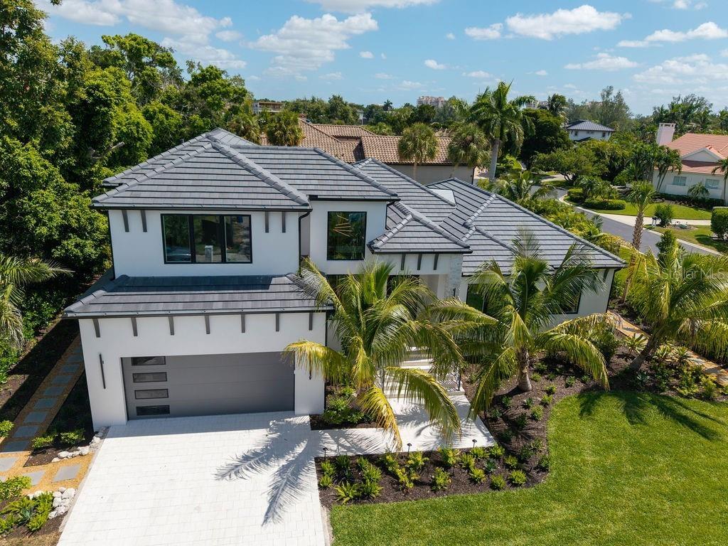 Ideally situated in The Bayou, an exclusive enclave behind the gates of Bay Isles.