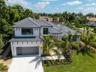 Ideally situated in The Bayou, an exclusive enclave behind the gates of Bay Isles.