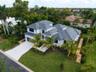 Beautifully landscaped grounds with lush tropical plantings and a complete irrigation system.