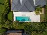 Back yard is the perfect place to entertain and even offers a putting green!