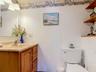 Half bath is downstairs near kitchen.