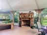 Wood burning fireplace on lanai.