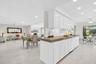 Beautiful kitchen with granite countertops, freshly painted solid wood cabinets, and recessed lighting~