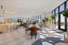 Floor-to-ceiling glass gives the social lounge a front-row seat to Tampa Bay.