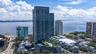 A commanding presence along Bayshore, with resort amenities woven into everyday life.