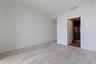 Bedroom 3 offers its own private bath, generous natural light, and a peaceful sense of separation.
