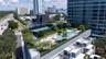 Resort living comes into full view with pool, court, and landscaped gathering spaces.