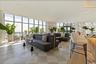 Walls of glass and relaxed seating make this a true extension of home.