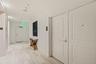 The private 24th-floor landing creates an arrival that feels discreet and distinctly residential.