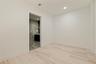 An expansive primary walk-in closet awaiting customization,