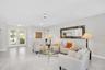 Jaw dropping glass front door entry with a convenient coat closet~
