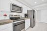 Convenient garage access and a large pantry closet~