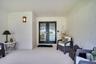 Spacious front patio for outdoor seating~