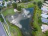 Welcoming pond at the beginning of Gillespie Dr N~